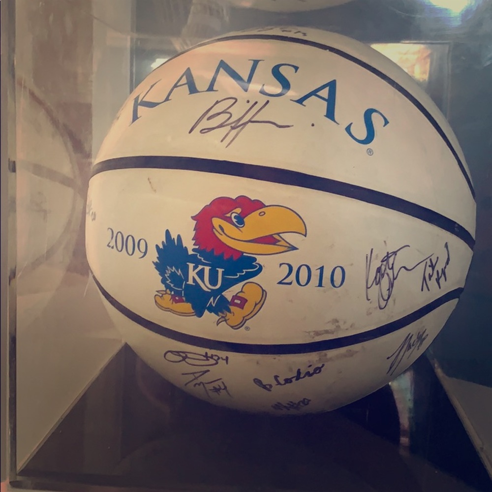 A KU basketball singed by everyone on the team